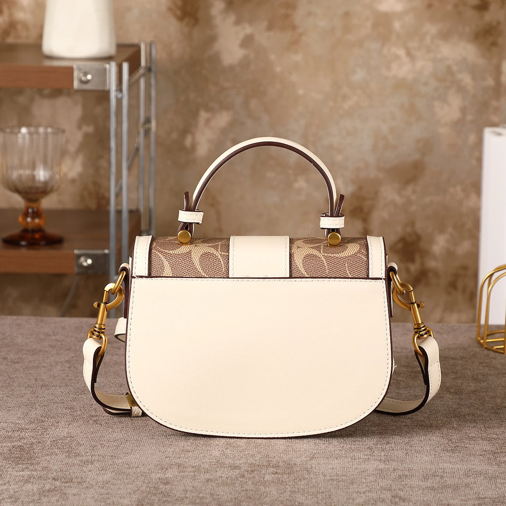 The Contrast Saddle Bag — Crossbody Statement Piece