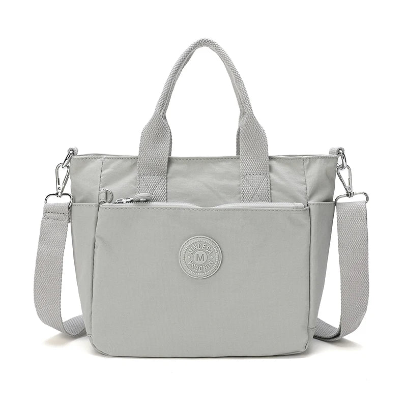 The Nylon Travel Crossbody — Lightweight Luxe
