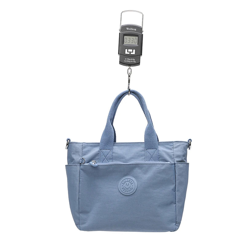 The Nylon Travel Crossbody — Lightweight Luxe