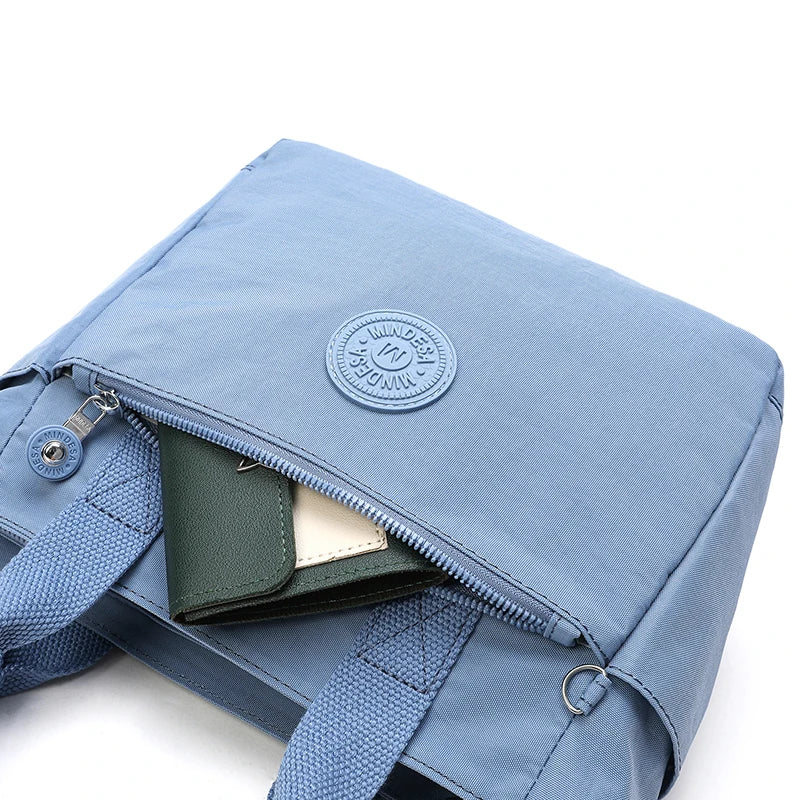 The Nylon Travel Crossbody — Lightweight Luxe