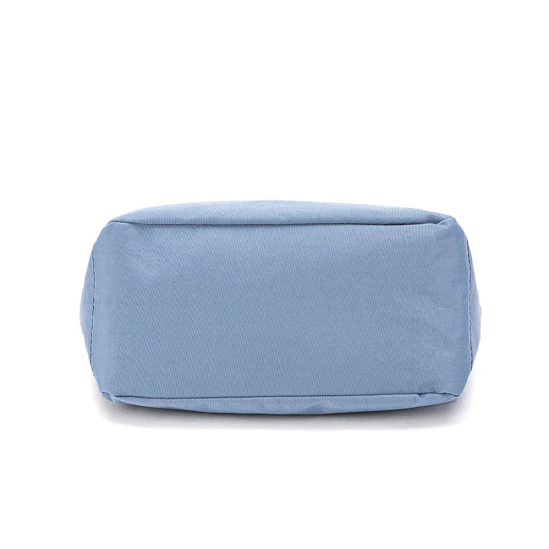 The Nylon Travel Crossbody — Lightweight Luxe